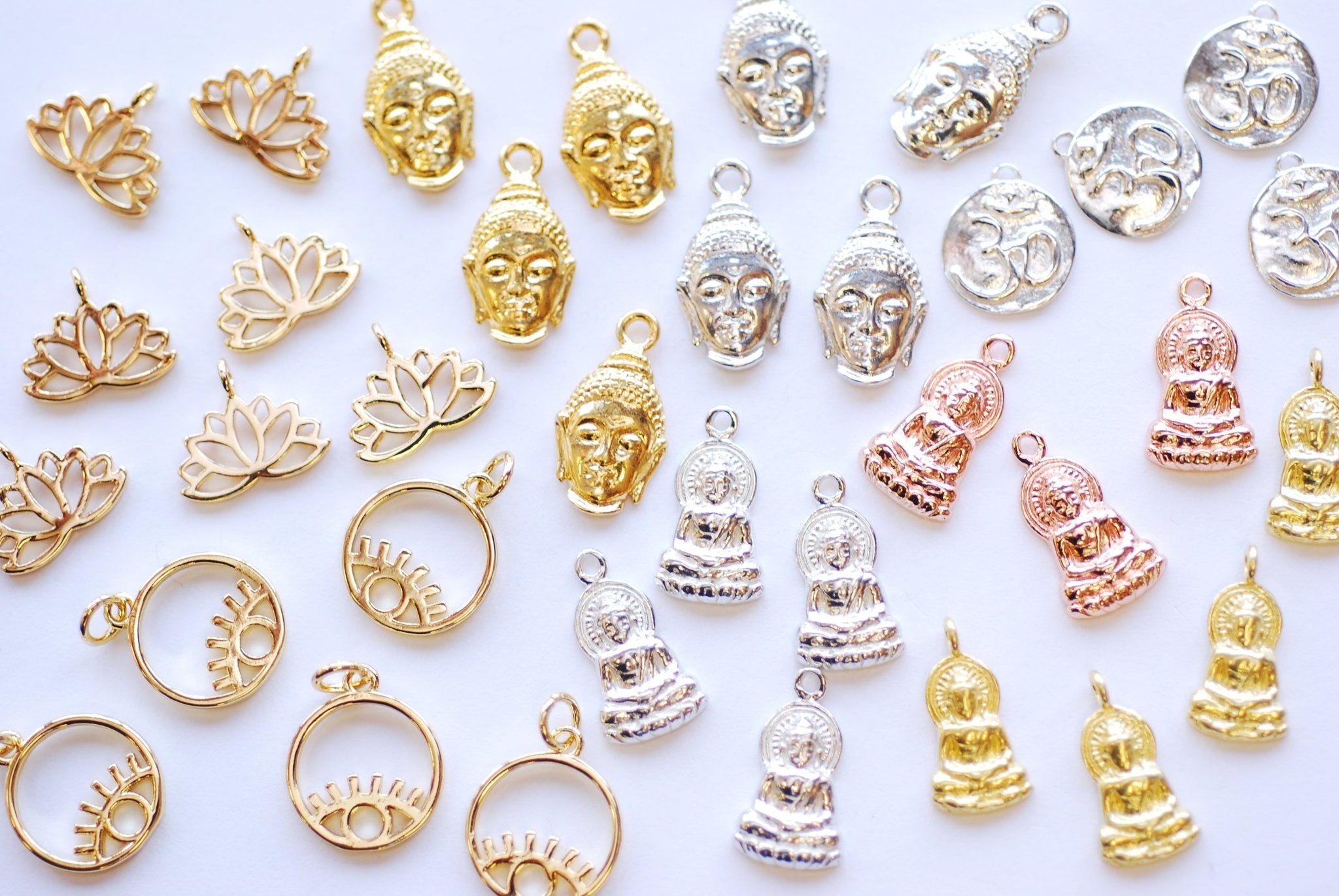 Wholesale Evil Eyes, Hamsa Hands, and Buddha Charms | 7 Must-Have Symbolic Charms - HarperCrown